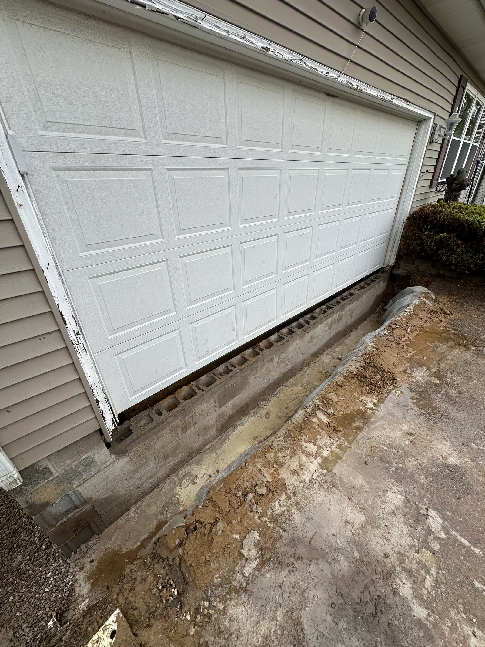 Garage and driveway area documentation during foundation repair project