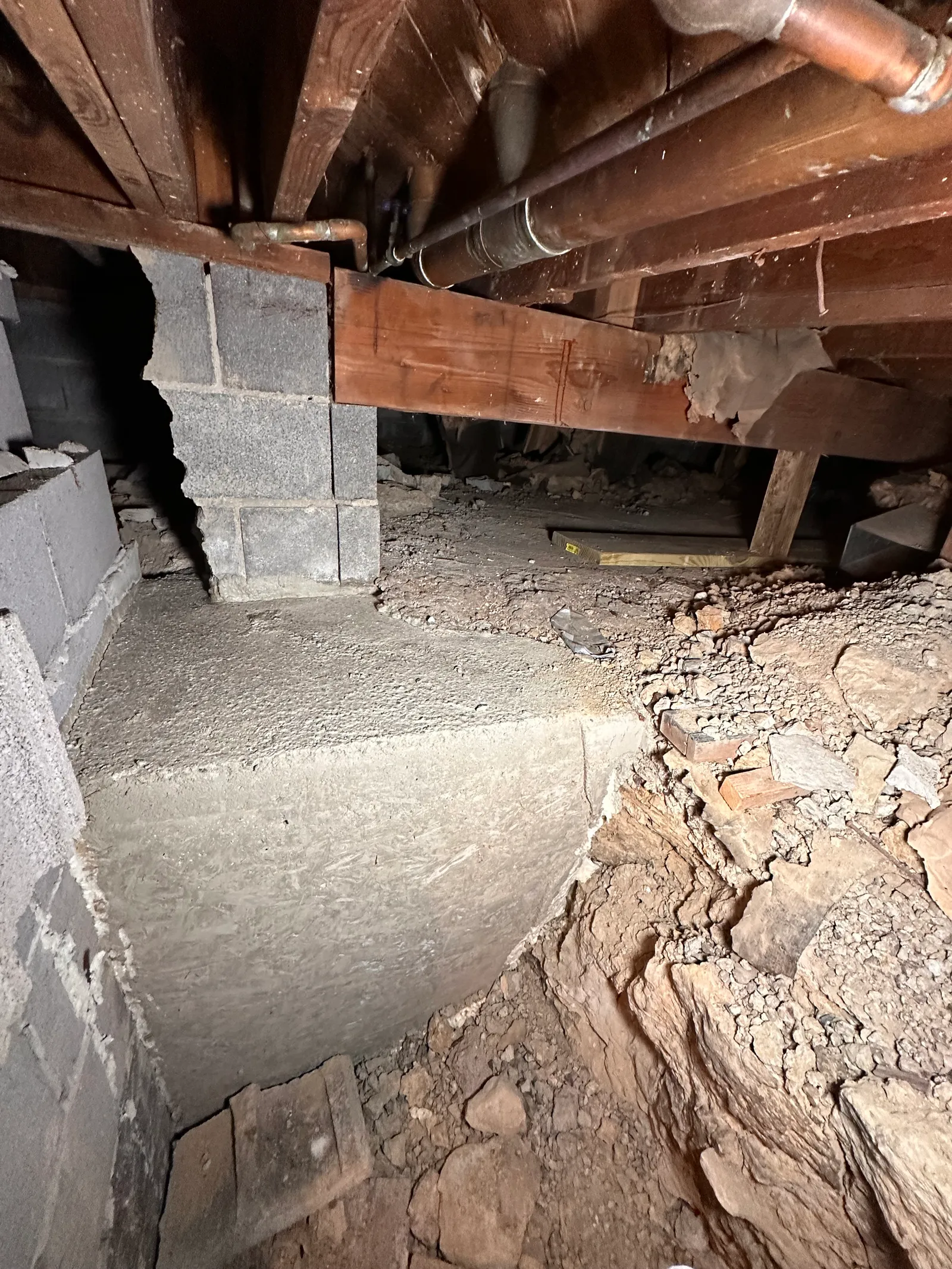 Old stone and mortar foundation wall assessment in Cleveland historic home